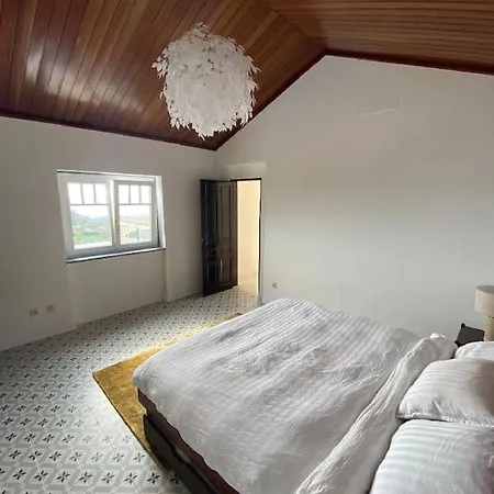 Casa Rosas Carvoeira