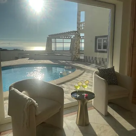 Casa Rosas Carvoeira