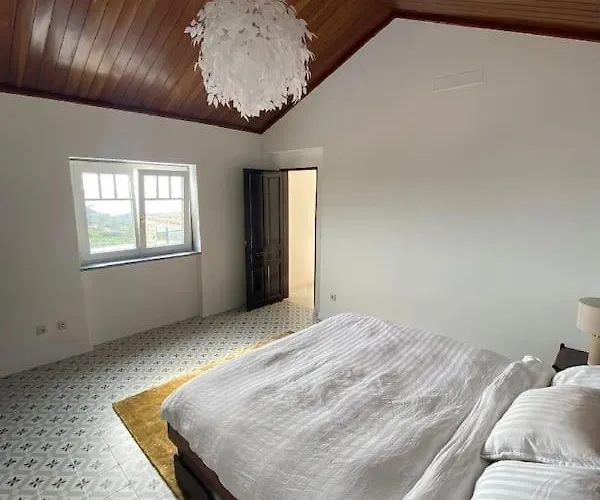 Casa Rosas Carvoeira